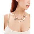 Accessorize statement flower necklace in gold