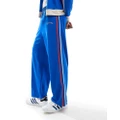Reclaimed Vintage baggy sport track trackies with side stripe in blue (part of a set)