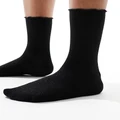 Vero Moda ribbed glitter socks with frill edge in black