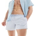 Lacoste logo swim shorts in light blue