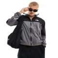The North Face NSE Windshell zip track top in grey and black