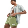 Tommy Hilfiger monotype short drawstring label swim shorts in olive-Green