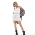 Calvin Klein Jeans cargo micro mini skirt in white wash - ASOS Exclusive (part of a set)