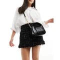 DKNY Arden top handle bag with cross body strap in black croc