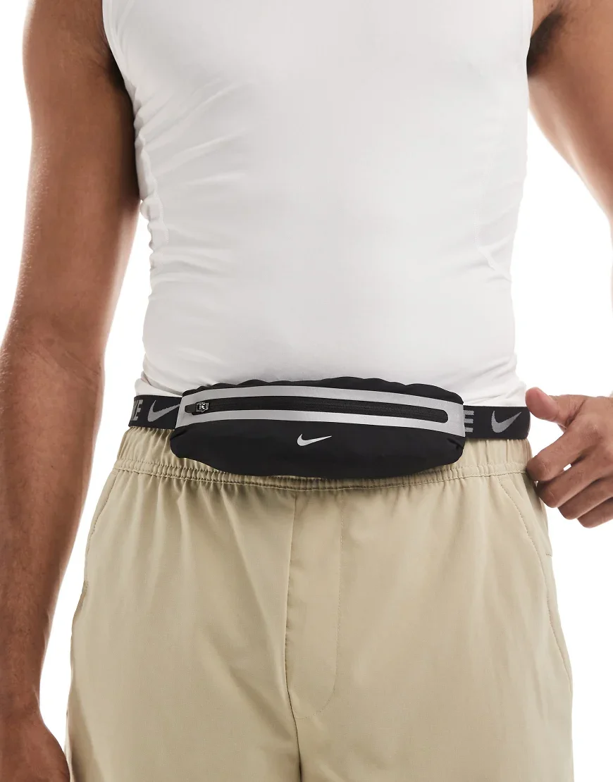 Nike slim waistpack in black and silver