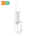 Xiaomi Mijia Oral Irrigator Portable Water Dental Flosser Water Jet Cleaning Tooth Toothpick Mouthpiece Denture Cleaner Teeth Brush 2200mAh USB Rechargeable 200ml Water Tank